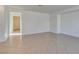Neutral living space featuring tile floors, recessed lighting, and doorway to other rooms in the home at 3774 Dusky Flycatcher St, Las Vegas, NV 89122