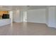Open-concept living room featuring tile flooring and neutral color palette at 3774 Dusky Flycatcher St, Las Vegas, NV 89122