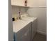 Laundry room with white washer and dryer at 3831 Atlantis St, Las Vegas, NV 89121