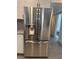 Stainless steel LG refrigerator with water and ice dispenser at 3831 Atlantis St, Las Vegas, NV 89121