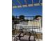 Rooftop patio with comfortable seating, an open pergola, and views of the surrounding neighborhood at 3831 Atlantis St, Las Vegas, NV 89121