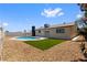 An inviting outdoor oasis featuring a pool and green space at 4450 San Rafael Ave, Las Vegas, NV 89120