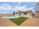 The private backyard boasts a sparkling pool, low-maintenance landscaping, and room for entertaining at 4450 San Rafael Ave, Las Vegas, NV 89120