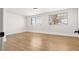 Bright bedroom with wood flooring and window overlooking neighborhood at 4450 San Rafael Ave, Las Vegas, NV 89120