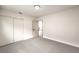 This spacious bedroom features carpet flooring and a convenient sliding door closet at 4450 San Rafael Ave, Las Vegas, NV 89120