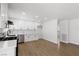 Updated kitchen features white cabinets, stainless steel appliances, and modern design at 4450 San Rafael Ave, Las Vegas, NV 89120