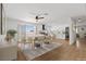 Open concept kitchen and dining area with modern finishes and backyard access at 4450 San Rafael Ave, Las Vegas, NV 89120