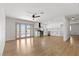Bright, open-concept living space with modern kitchen, dining area, and access to the backyard at 4450 San Rafael Ave, Las Vegas, NV 89120