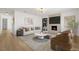 Inviting living room with a modern fireplace, stylish decor, and neutral color palette at 4450 San Rafael Ave, Las Vegas, NV 89120