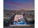 A sprawling property features a pool, spa, and outdoor living area, as seen from above at 4505 Amazing View St, Las Vegas, NV 89129