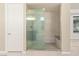 Modern bathroom with a glass-enclosed shower and a built-in bench at 4505 Amazing View St, Las Vegas, NV 89129