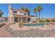 A private backyard with a rock-lined pool and patio area for outdoor living at 4548 Switchback St, North Las Vegas, NV 89031