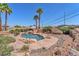 Backyard pool surrounded by desert landscaping, offering a serene retreat at 4548 Switchback St, North Las Vegas, NV 89031