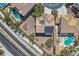 Aerial rooftop perspective showcasing solar panels, desert landscaping and nearby sidewalks at 4804 Laurentia Ave, Las Vegas, NV 89141