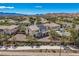 Aerial view of a two-story home with solar panels and a landscaped backyard at 4804 Laurentia Ave, Las Vegas, NV 89141