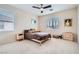 Comfortable bedroom featuring natural light, ceiling fan, and a cozy twin-sized bed at 4804 Laurentia Ave, Las Vegas, NV 89141