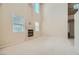 Bright living room with carpet, a fireplace, and plenty of natural light at 4804 Laurentia Ave, Las Vegas, NV 89141