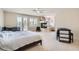 Spacious main bedroom with fireplace, and access to balcony with shutters at 4804 Laurentia Ave, Las Vegas, NV 89141