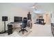Spacious office with grand piano, computer setup, and ample room for creative work at 4804 Laurentia Ave, Las Vegas, NV 89141