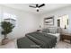 Staged bedroom featuring neutral decor, natural light, and stylish furnishings at 50 Armstrong Cir, Henderson, NV 89015