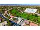 Golf course community home featuring a lush greenway, mature trees, and xeriscaped landscaping in a desirable location at 5000 Linkside Dr, Las Vegas, NV 89130