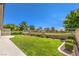 Picturesque backyard showcasing lush greenery, manicured landscaping, and a tranquil outdoor space at 5000 Linkside Dr, Las Vegas, NV 89130