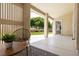 Relaxing covered patio with stylish furniture, connecting indoor and outdoor spaces at 5000 Linkside Dr, Las Vegas, NV 89130