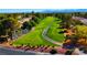 Aerial view of the beautifully manicured golf course with winding paths and mature trees at 5000 Linkside Dr, Las Vegas, NV 89130