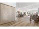 Spacious open concept living area with wood flooring, recessed lights, neutral paint, and modern decor at 5000 Linkside Dr, Las Vegas, NV 89130