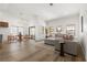 Bright living room featuring a neutral color palette, wood floors, and lots of natural light at 5000 Linkside Dr, Las Vegas, NV 89130