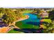 Scenic view of a pond on the golf course surrounded by lush landscaping at 5000 Linkside Dr, Las Vegas, NV 89130