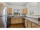 Kitchen features granite countertops, stainless steel appliances, and ample cabinet space at 5250 S Rainbow Blvd # 2106, Las Vegas, NV 89118