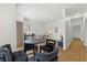 Open-concept living space with dining area, fireplace, and contemporary furnishings at 5250 S Rainbow Blvd # 2106, Las Vegas, NV 89118