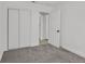 Clean bedroom features neutral carpet, a closet with sliding doors, and access to the hallway at 540 Kelsford Dr, Las Vegas, NV 89123