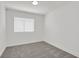Neutral bedroom features modern carpet and a window with blinds and white trim at 540 Kelsford Dr, Las Vegas, NV 89123
