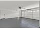 Spacious two-car garage with overhead door and painted floor at 540 Kelsford Dr, Las Vegas, NV 89123