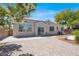 Backyard featuring desert landscaping, block wall, and patio space at 6032 Red Glitter St, North Las Vegas, NV 89031