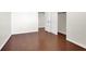 Bright bedroom with laminate floors and closet with bifold doors at 6032 Red Glitter St, North Las Vegas, NV 89031