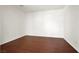 Neutral bedroom featuring hardwood floors and ample natural light at 6032 Red Glitter St, North Las Vegas, NV 89031