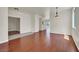Open-concept living area featuring hardwood floors, neutral paint, and an open layout at 6032 Red Glitter St, North Las Vegas, NV 89031