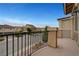 Balcony view showcases the neighborhood street with charming homes at 6056 Atlantis Dream Ave, Las Vegas, NV 89139