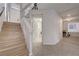 Entryway showcasing staircase and nearby laundry room at 6056 Atlantis Dream Ave, Las Vegas, NV 89139
