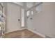 Bright entryway features light wood flooring, recessed lighting, and a modern front door at 6056 Atlantis Dream Ave, Las Vegas, NV 89139