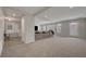 Spacious living room featuring neutral colors, recessed lighting, and plush carpeting at 6056 Atlantis Dream Ave, Las Vegas, NV 89139