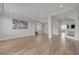 Expansive living room boasts recessed lighting and neutral color palette at 6056 Atlantis Dream Ave, Las Vegas, NV 89139