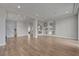 Spacious living area featuring hardwood floors, recessed lights, and modern design at 6056 Atlantis Dream Ave, Las Vegas, NV 89139