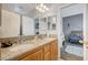 Bathroom with a double vanity and granite countertops at 6271 Sunset Spring Ave, Las Vegas, NV 89122