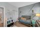 Stylish Bedroom features a crib and geometric accent wall at 6271 Sunset Spring Ave, Las Vegas, NV 89122