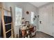Bright entryway featuring a decorative display shelf, wood-look floors, and natural light from the windows at 6271 Sunset Spring Ave, Las Vegas, NV 89122