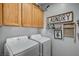 Convenient laundry room featuring a side-by-side washer and dryer at 6271 Sunset Spring Ave, Las Vegas, NV 89122